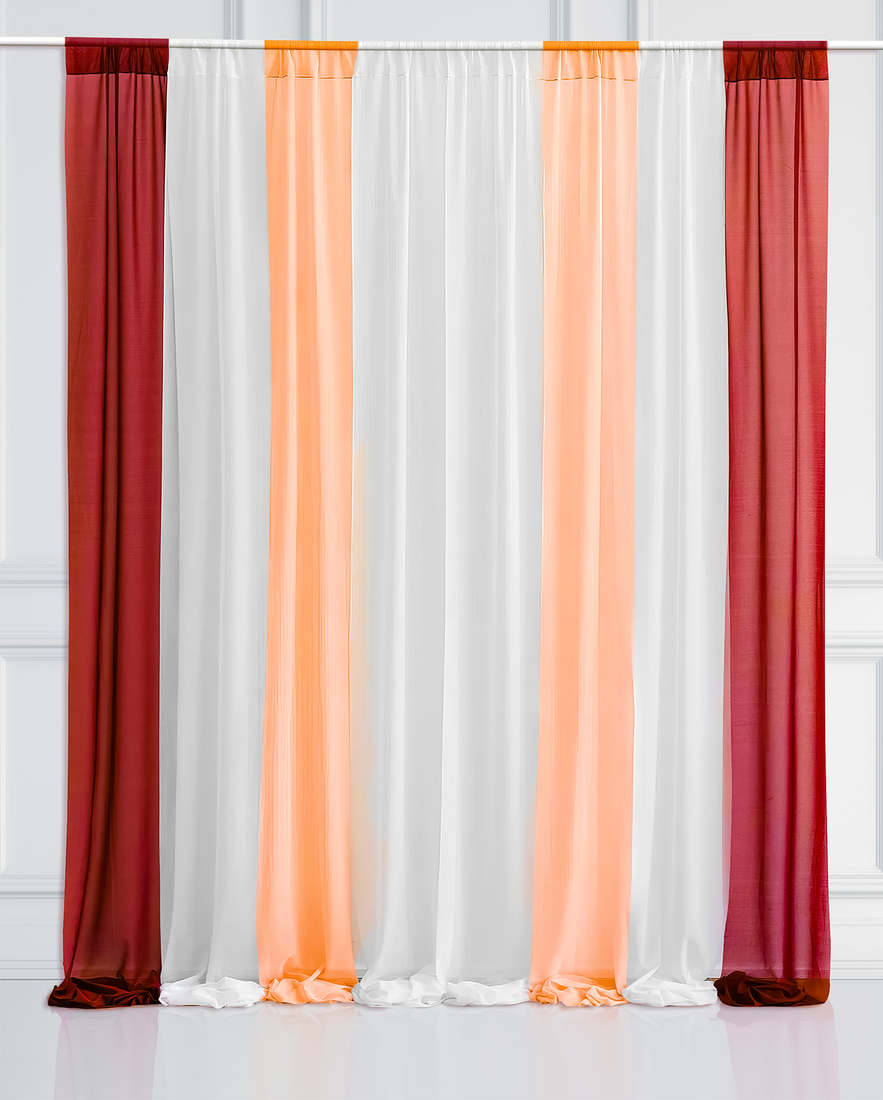 A row of colorful curtains hanging on a pole.